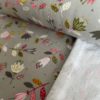 French Terry coton bio fond gris imprimé floral